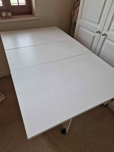 Photo of free Folding white table (Spinney Hill) #1
