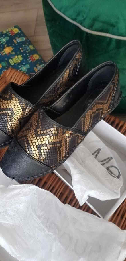 Photo of free black and gold shoe size 7 (Dukinfield) #1