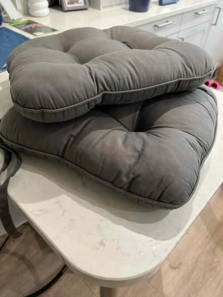 Photo of free 2 Grey tie-on seat cushions (Cheltenham GL53) #1