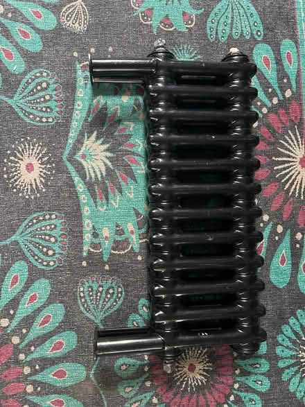 Photo of free Small cast iron black radiator (TN35 Ore) #1