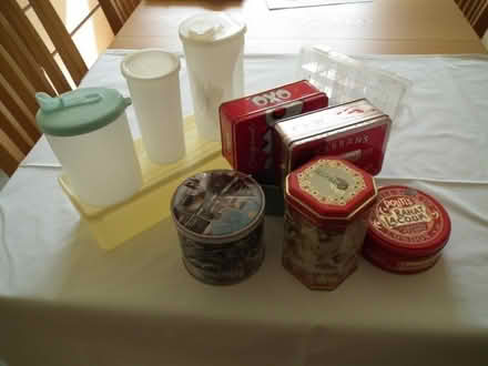 Photo of free Collection of tins and plastic tubs. Good condition. (Lower Earley RG6) #1