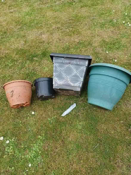 Photo of free Plastic flower pots (Woodley RG5) #1