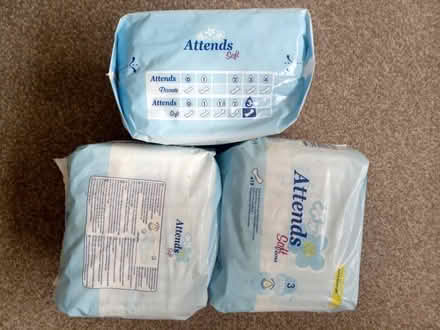 Photo of free 3 Unopened packs Attends pads (Franklands Village RH17) #1