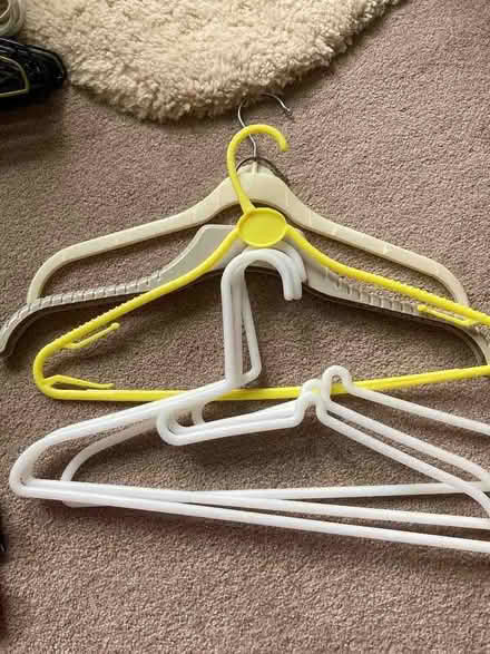 Photo of free 6 assorted plastic coat hangers (Abbeville Village SW4) #1