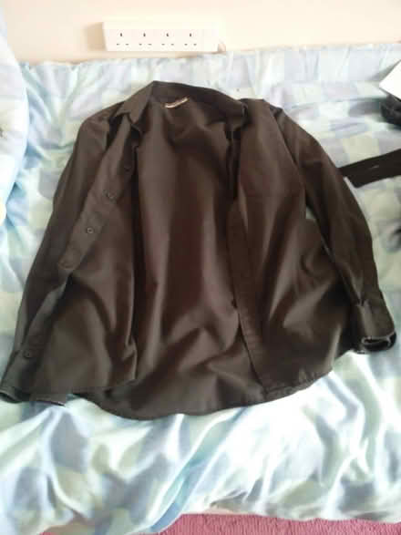 Photo of free Black men's shirt (NG10 Fields Farm Estate) #1