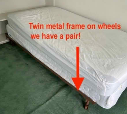 Photo of free Metal bedframes on rollers- 2 twins (NW DC Friendship/Chevy Chase) #2