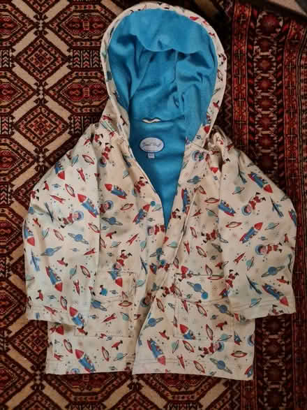 Photo of free Lined Raincoat, age 4-5, spaceships (Near Holborn/Rosebery Ave) #1
