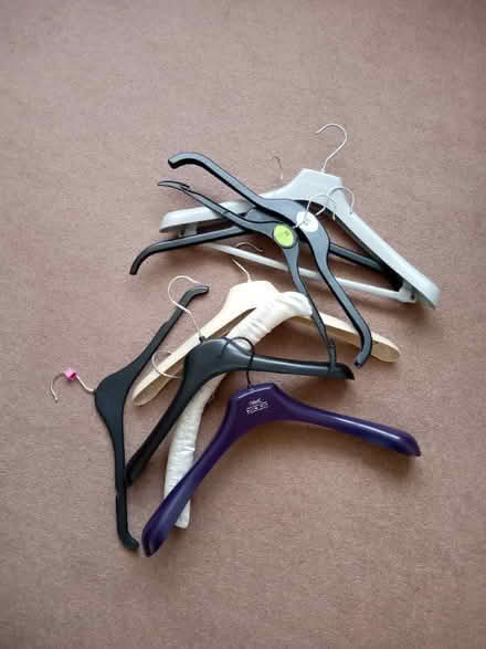 Photo of free Assorted clothes hangers (IP4) #1