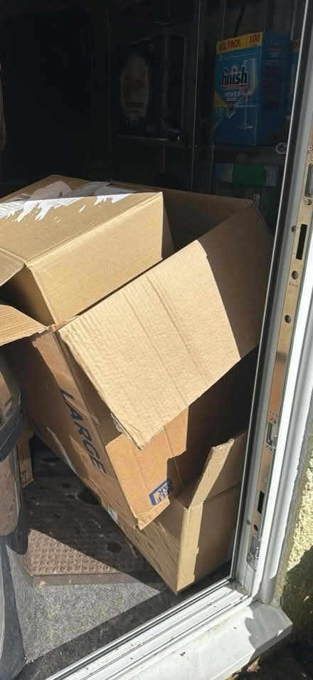 Photo of free Moving boxes and paper (TQ2) #1