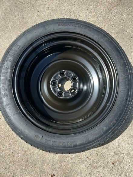 Photo of free Spare “doughnut” tire (Farmington and Eleven Mile Rds) #2