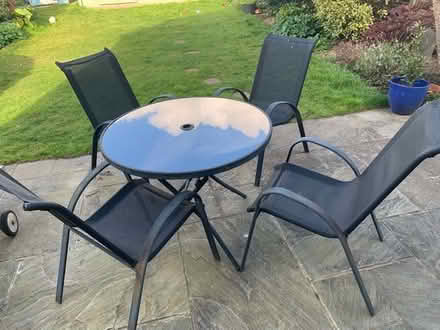 Photo of free Outdoor table, 4 chairs & parasol (Horsell, Woking) #1