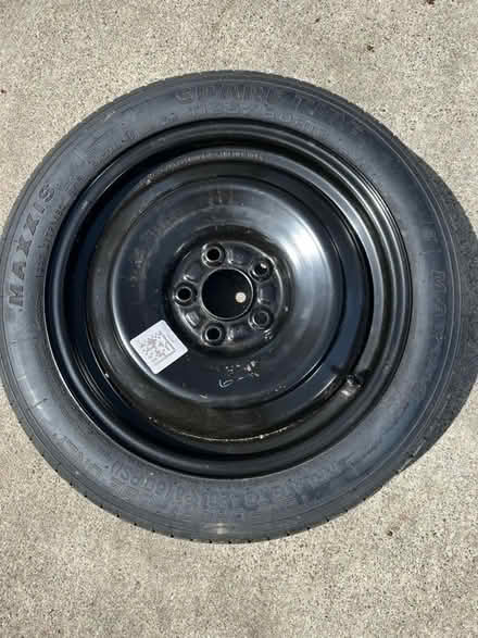 Photo of free Spare “doughnut” tire (Farmington and Eleven Mile Rds) #1