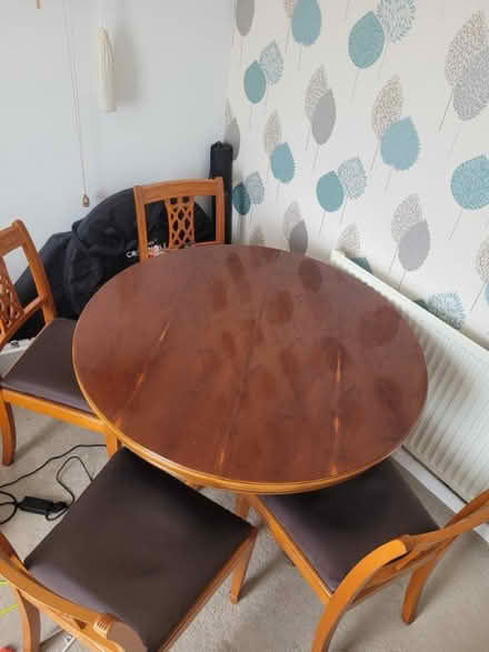 Photo of free Round extendable wooden dining table with matching 4 chairs (Roseacre ME15) #1