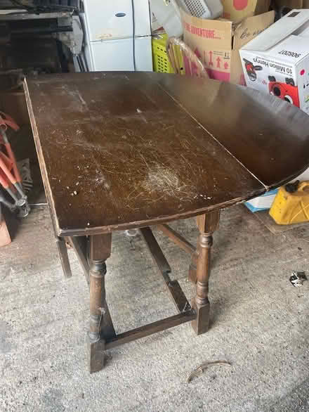 Photo of free Large drop leafed table (burton bradstock) #3