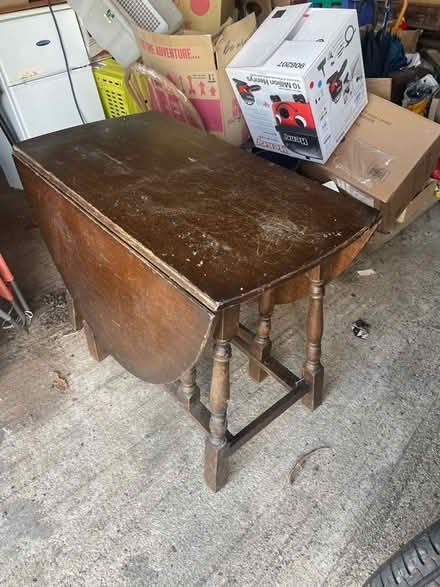 Photo of free Large drop leafed table (burton bradstock) #1