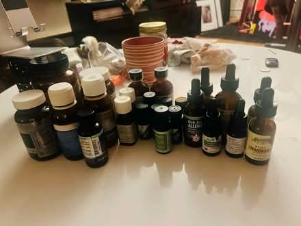 Photo of free Small amber and blue glass bottles (Queen Anne) #1