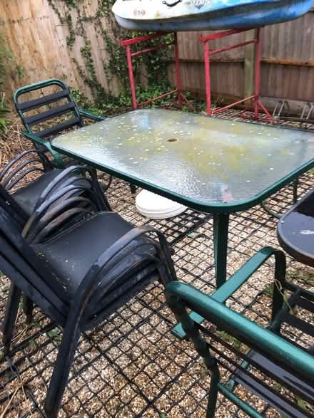 Photo of free 2 x garden tables and chairs (West Bay) #3