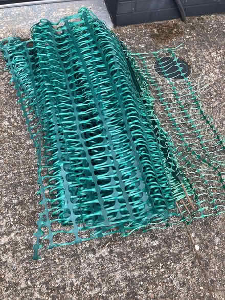 Photo of free Green plastic fence with stakes (GU24 Bisley) #1