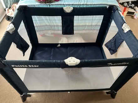 Photo of free Travel cot, mattress & bag (Surbiton) #1