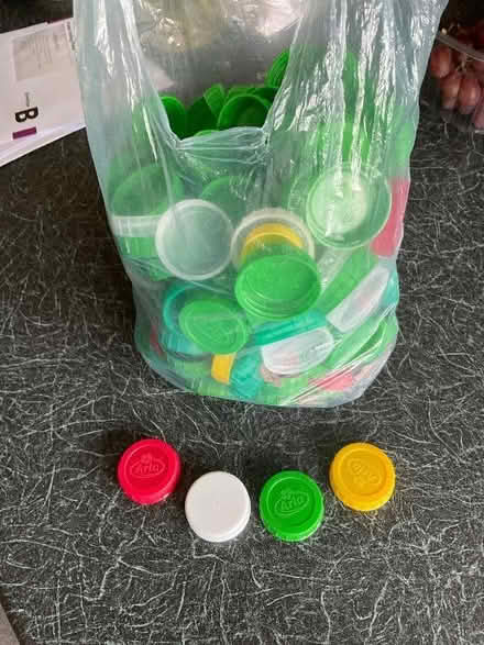 Photo of free Bag of Coloured Plastic Caps from Milk Cartons (Alton GU34) #1