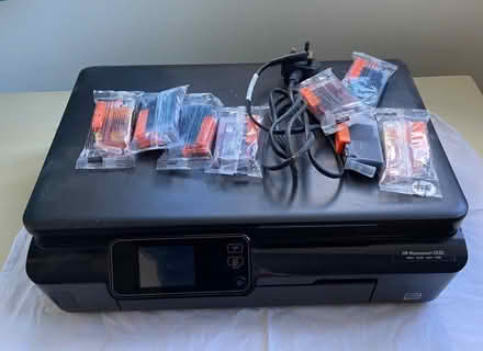 Photo of free HP photosmart 5520 printer and inks spares/repair (Horsell GU21) #1