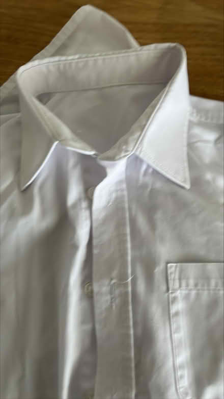 Photo of free 2 short sleeved white school shirts ages 12 - Kempston #1
