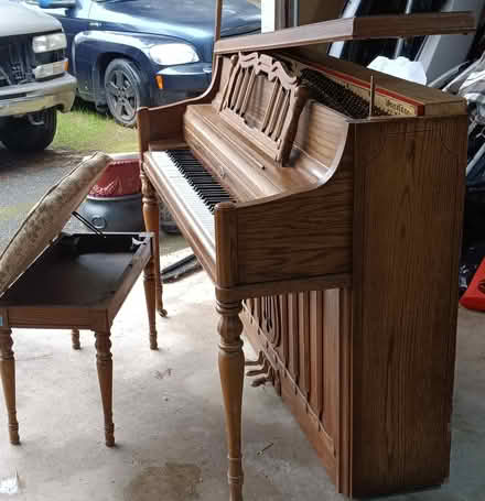 Photo of free Wurlitzer piano with bench (Dover DE) #1