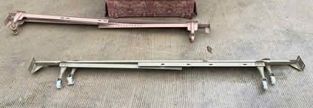 Photo of free Metal bedframes on rollers- 2 twins (NW DC Friendship/Chevy Chase) #1