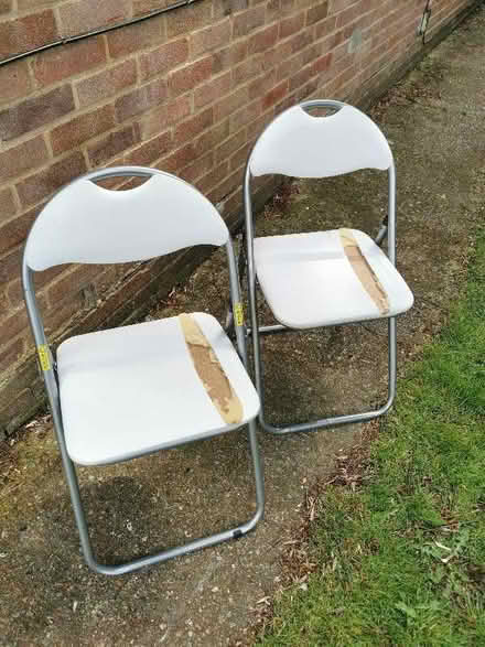 Photo of free 2 x White folding chairs (Redhill RH1) #1