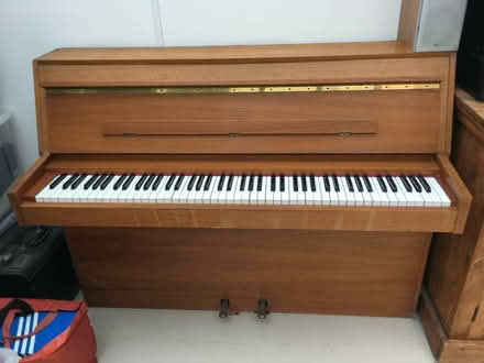 Photo of free Upright piano seeking new home (New Marston OX3) #1
