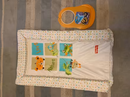 Photo of free Changing mat, bib, dummies (B42 Great Barr) #1