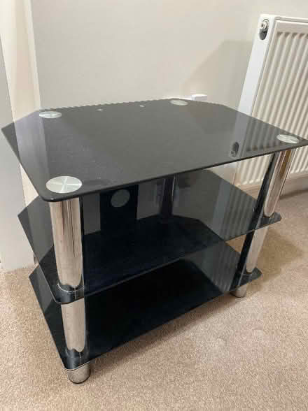Photo of free Small black glass tv unit (Bracknell Forest RG40) #1