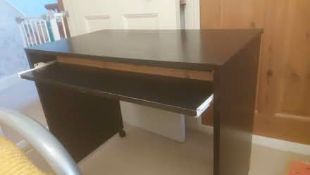 Photo of free Small wheeled desk with removable keyboard drawer. (Tewkesbury GL20) #1