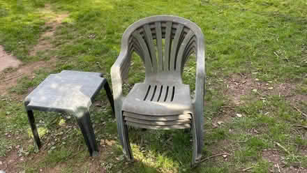 Photo of free 4x stacking garden chairs and side table (Costessey NR8) #1