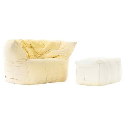Photo of free Yellow Ligneroset footstool (Gomshall GU5) #1