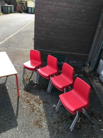 Photo of free 8 Infant reds chairs and 1 red table. (Little Neston CH64) #1