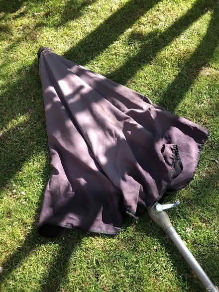 Photo of free Huge 2.4m black sun umbrella needs re threading (Wallands Park BN7) #2