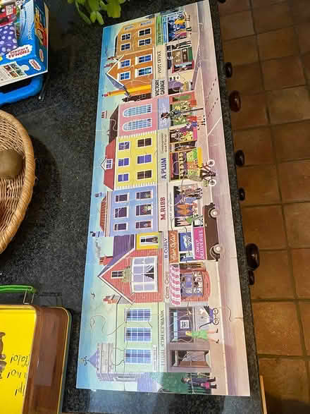 Photo of free Wooden puzzle and Gruffalo tin (West Ewell Epsom KT19) #1