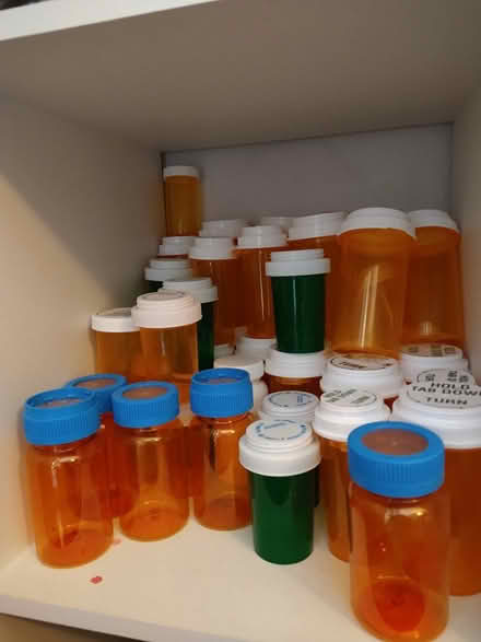 Photo of free empty pill bottles- various types (downtown novato)