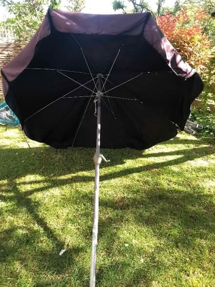 Photo of free Huge 2.4m black sun umbrella needs re threading (Wallands Park BN7) #1