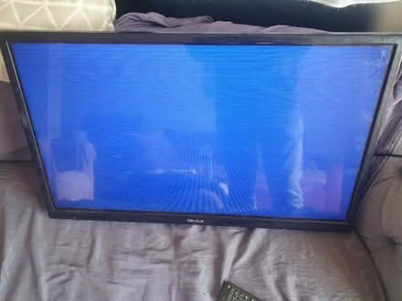 Photo of free 32" TV remote and wall bracket (North Road N7) #1