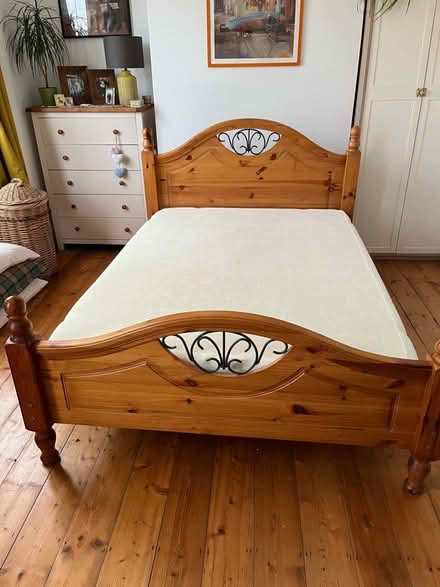 Photo of free Double wooden bed frame + mattress (E10) #1