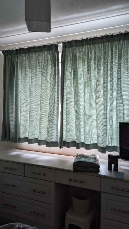 Photo of free Pair of lined plain green curtains (Wellingborough NN8) #2