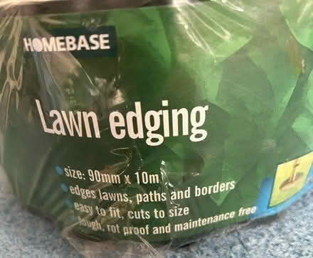 Photo of free Dark green plastic lawn edging (Martham NR29) #1