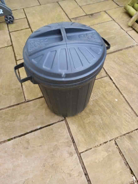 Photo of free Black plastic dustbin with lid (Old Road OX3) #1