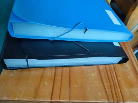 Photo of free Two A4 folders containing ~10 transparent pockets (Highway SL6) #1