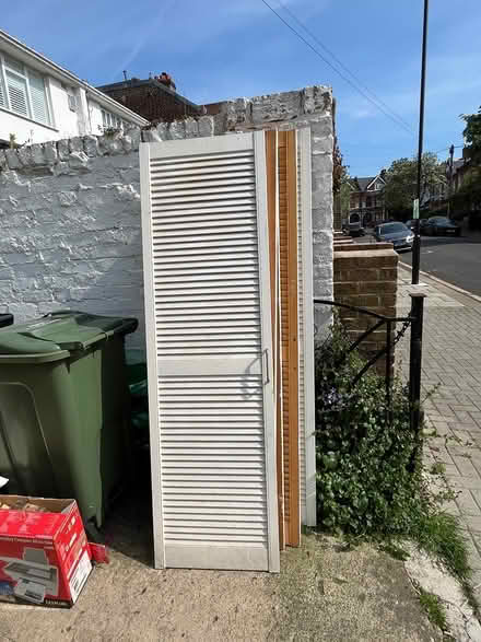 Photo of free 6 wooden louvred doors (Clapham SW4) #2