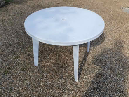 Photo of free Round white garden table - collect 12 May (Little Bookham KT23) #1
