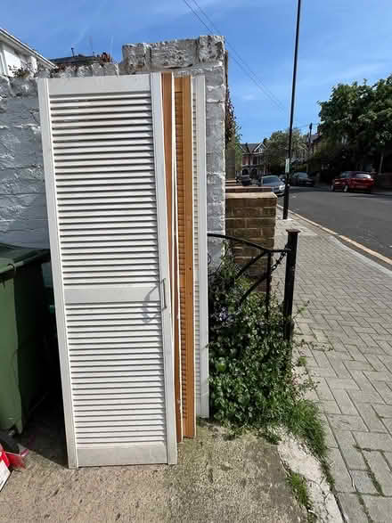 Photo of free 6 wooden louvred doors (Clapham SW4) #1