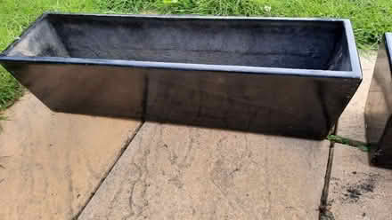 Photo of free Pair of black gloss fibreglass planters (Emmbrook RG41) #4